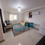 اتاق پذیرایی به همراه مبلمان و شوفاژ آپارتمان در ایزدشهر 58658058670