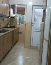 آشپزخانه، یخچال ، هود و کمد دیواری ام دی اف آپارتمان در نور 458484